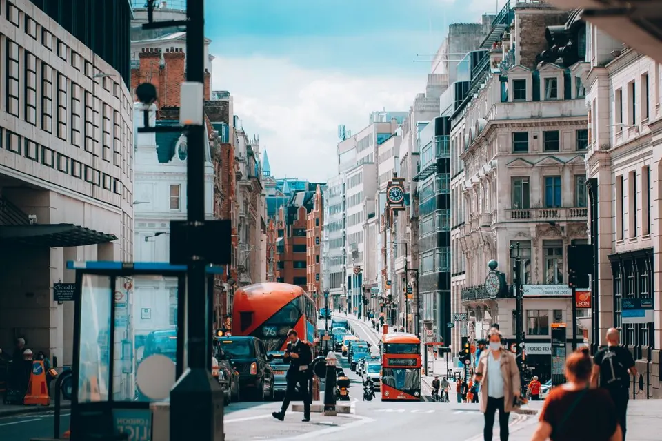 A busy London street with a red double-decker bus